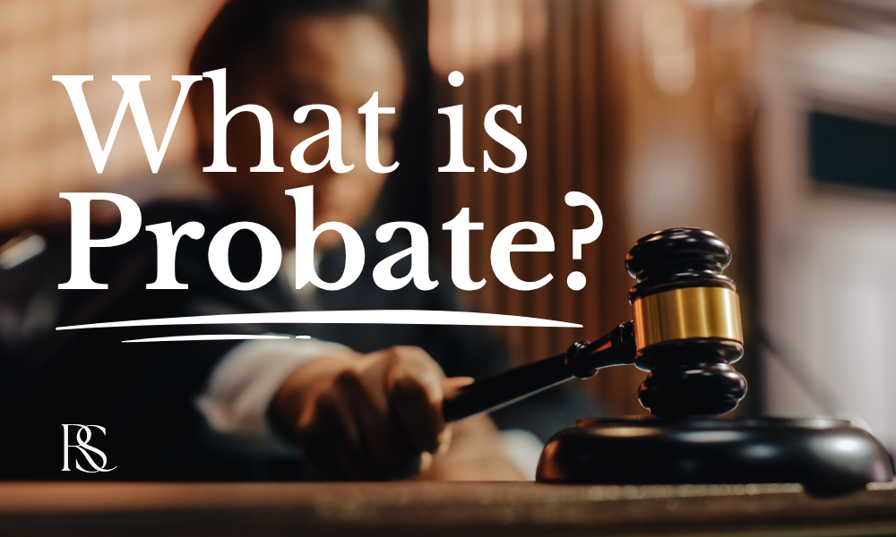 Judge holding a gavel in a courtroom with the text ‘What is Probate?’ overlay. This image represents the legal process of probate — the court-supervised procedure for settling a deceased person’s estate. Learn what probate is, when probate is required in California, and how to avoid probate through strategies like creating a living trust, proper asset titling, and estate planning with an experienced attorney.