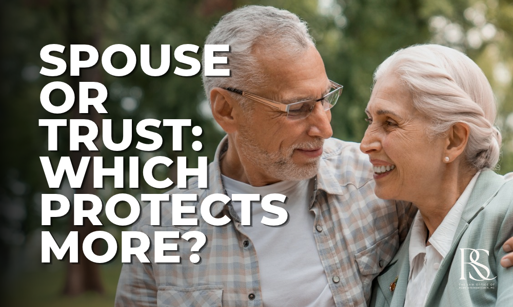 An older couple stands close together outdoors, representing spouses who are deciding whether to name each other or a trust as life insurance beneficiary in their estate plan.